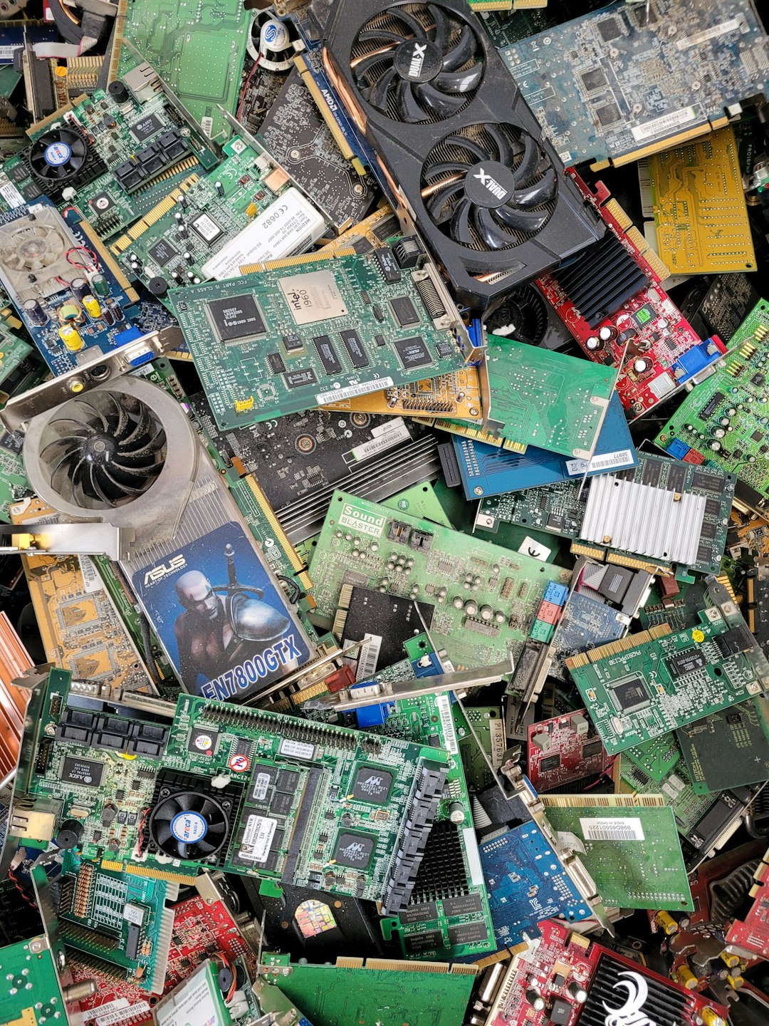 portfolio-06 Stack of graphics cards and motherboards in a landfill site, Germany